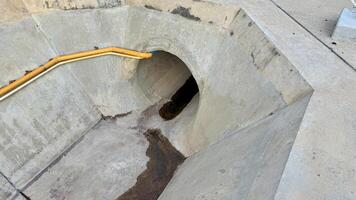 Concrete Drainage Tunnel A high-angle view of a newly constructed concrete drainage tunnel, showcasing its robust design and efficient water management capabilities. photo