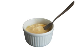 Fresh butter in a white container with a metal spatula isolated on transparent background png