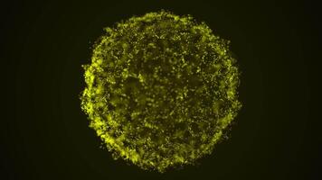 Yellow glowing particle sphere with abstract motion on a dark background video