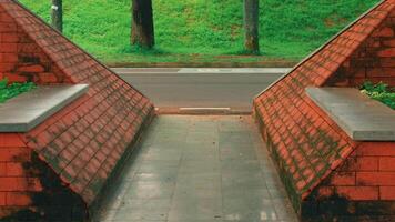 Symmetrical Pathway with Red Brick Structures video