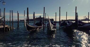 Gondolas Floating By A Dock In Venice Shot In Slow Motion video