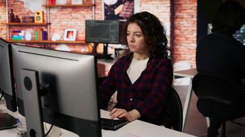 CTO manager overseeing work done by engineer in tech agency providing software development services. Startup office supervisor checking up on IT expert using artificial intelligence, camera B video
