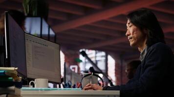 AI startup office admin asks questions to senior team leader before starting implementing machine learning. Tech venture company worker requests help from manager to fix code bugs, camera B video