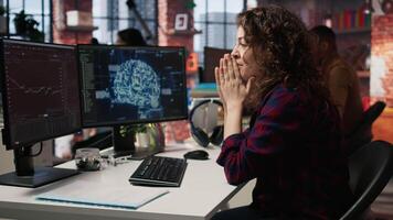Startup employee shocked after successfully launching on stock market, generating high investment returns. Tech venture manager surprised after securing funding for pioneering software, camera A video