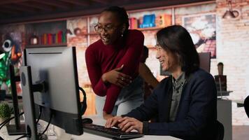 Programmer coming to AI startup office CTO manager desk to request help. Employee asks questions to senior team leader in artificial intelligence software development agency, camera A video