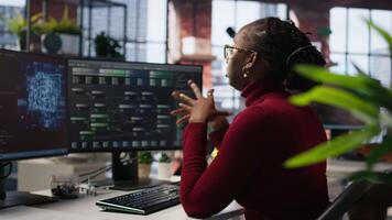 Tired admin in AI startup office having strained eyesight from overworking, getting help from senior manger. Woman removing eyeglasses to rub eyes, encouraged by team leader to take break, camera A video