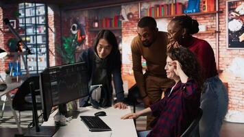 Overjoyed multiethnic startup team celebrating high valuation on stock exchange, raising money. Happy tech business entrepreneurs securing angel investments, becoming unicorn company, camera A video