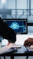 Vertical Manager meeting with client in data center to review files, doing handshake after finalizing deal. Server room supervisor reaching agreement with customer after checking documentation, camera A video