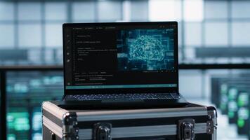 Laptop in front of data center engineers in background deploying artificial intelligence tools. AI coding on notebook screen next to technicians inspecting server clusters, camera A close up video