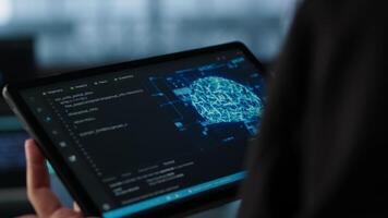 Programmer in data center using AI on tablet, verifying compliance requirements of supercomputers. Server hub worker optimizing resource utilization using device, camera A close up video