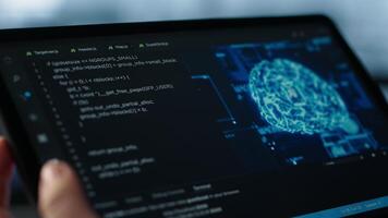 Data center technician using artificial intelligence on tablet to prevent vulnerabilities. Employee using device to review firewall rules, enforcing AI cybersecurity protocols, camera A close up video