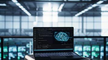 Artificial intelligence technology coding on laptop in data center with programmers in background employing machine learning models. Notebook used by AI IT experts, camera B close up video