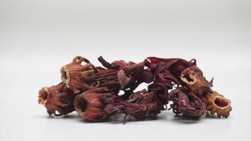 Pile of Dried Roselle on White Background photo