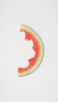 Slice of Watermelon Rind on White Background photo
