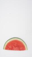 Slice of Fresh Watermelon on White Background photo