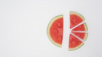 Half and Slices Watermelon on White Background photo