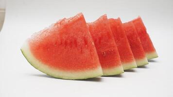 A Quarter Slice of Watermelon on White Background photo