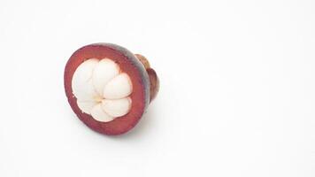 Cut in Half of Mangosteen on White Background photo
