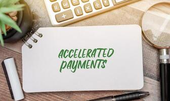 Accelerated payments concept. Making additional or increased payments on a mortgage loan with the goal of reducing the loan's principal balance more quickly. Real estate and finance. photo