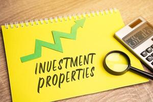 Investment Properties concept - land or piece building that is bought with the intention of producing a financial return, as opposed to personal use. Business and finance concept photo
