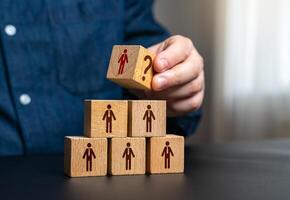 A businessman announces a competition for the post of leader after the dismissal of the previous one. Appointment of a leader to head a team or company. Corporate hiring, executive search. photo