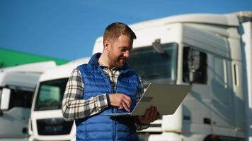 Supervisor giving loading instructions via radio at truck parking video