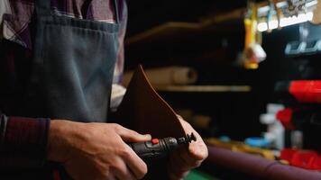 Leatherworker Polishing Edges with a Rotary Tool video