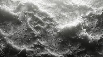 Abstract representation of textured waves resembling a lunar surface with intricate details photo