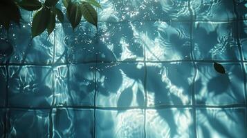 Tranquil underwater view showcasing shimmering tiles and gentle ripples with leaves above photo