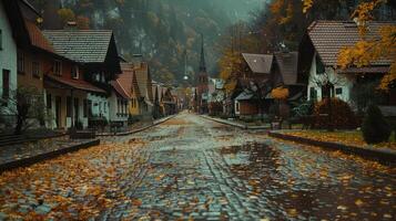 Serene autumn street scene with colorful leaves, quaint houses, and misty mountains in the background photo