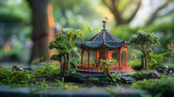 Miniature oriental gazebo surrounded by lush greenery in a serene garden setting at sunset photo