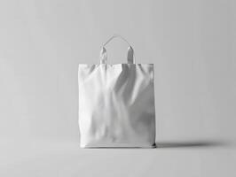 A white shopping bag on a plain surface photo