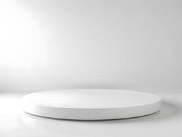 A white round table in front of a white wall photo