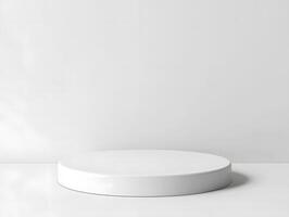 A white round table with a white surface photo