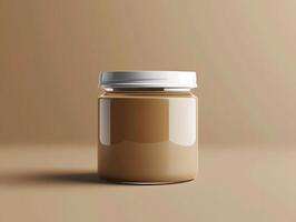 A jar of peanut butter on a table with a brown background photo