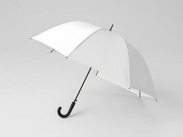 An open white umbrella on a gray background photo