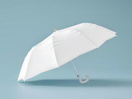 An open white umbrella on a blue background photo
