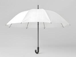 An open white umbrella on a gray background photo
