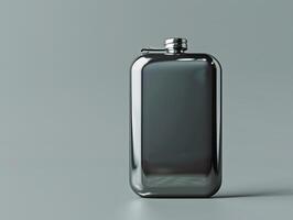 A black and silver flask on a gray background photo