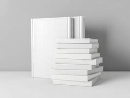 Stack of books on a table with a gray background photo