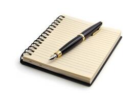 Pen and notebook on white background photo