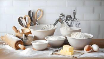 A table with many different types of baking ingredients photo