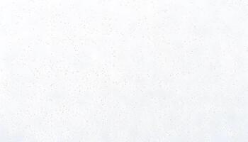 A white wall with a few spots of white paint photo