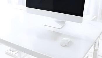 A white computer monitor on a desk in front of a window photo