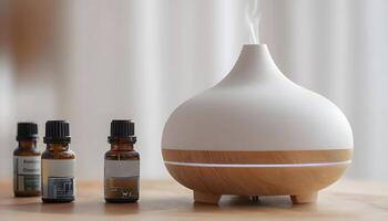 A white and wooden aroma diffuser with three different essential oils photo
