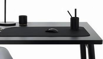 A black desk with a mouse pad and a lamp photo