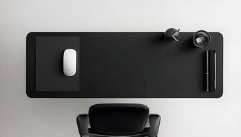 A black desk with a mouse and chair photo