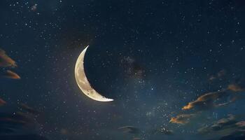 The moon is seen in the sky with clouds photo