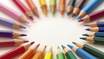 A creative arrangement of colored pencils forming a perfect circular pattern photo