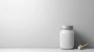 Milk jar and honey stick minimalist photo